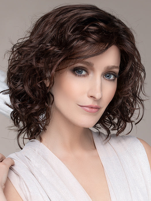 Remy Human Hair Wig DELICATE PLUS by ELLEN WILLE in DARK CHOCOLATE MIX   This image was styled as follows: Curling iron 350°F with a ¾” barrel size, alternating curling directions. Finished by lightly scrunching hair with a small amount of BeautiMark Velvet Spray Gel 